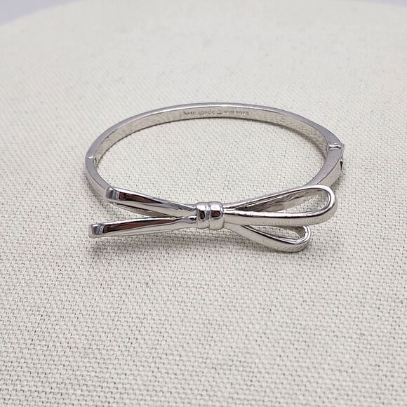 Kate Spade Skinny Mini Double Bow Silver Bangle Bracelet - Picture 1 of 3